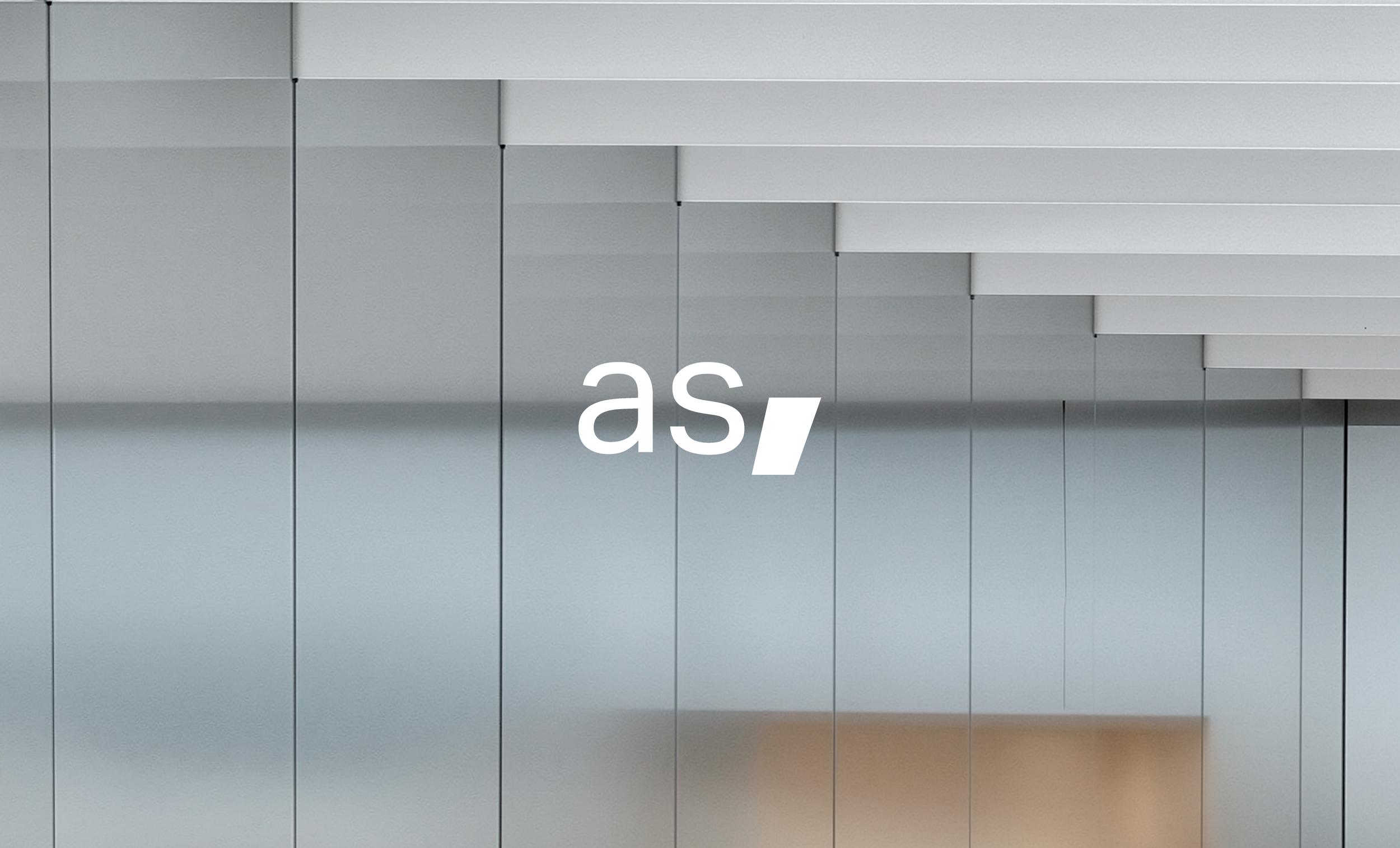 architecturestudio wordmark on a textured glass ceiling photo
